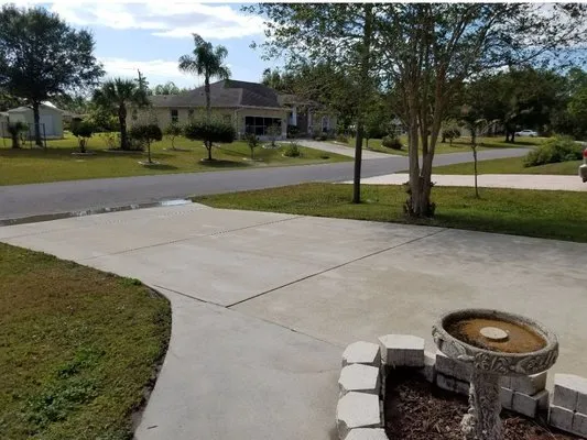 Touch Of Grass Lawn And Landscaping Logo