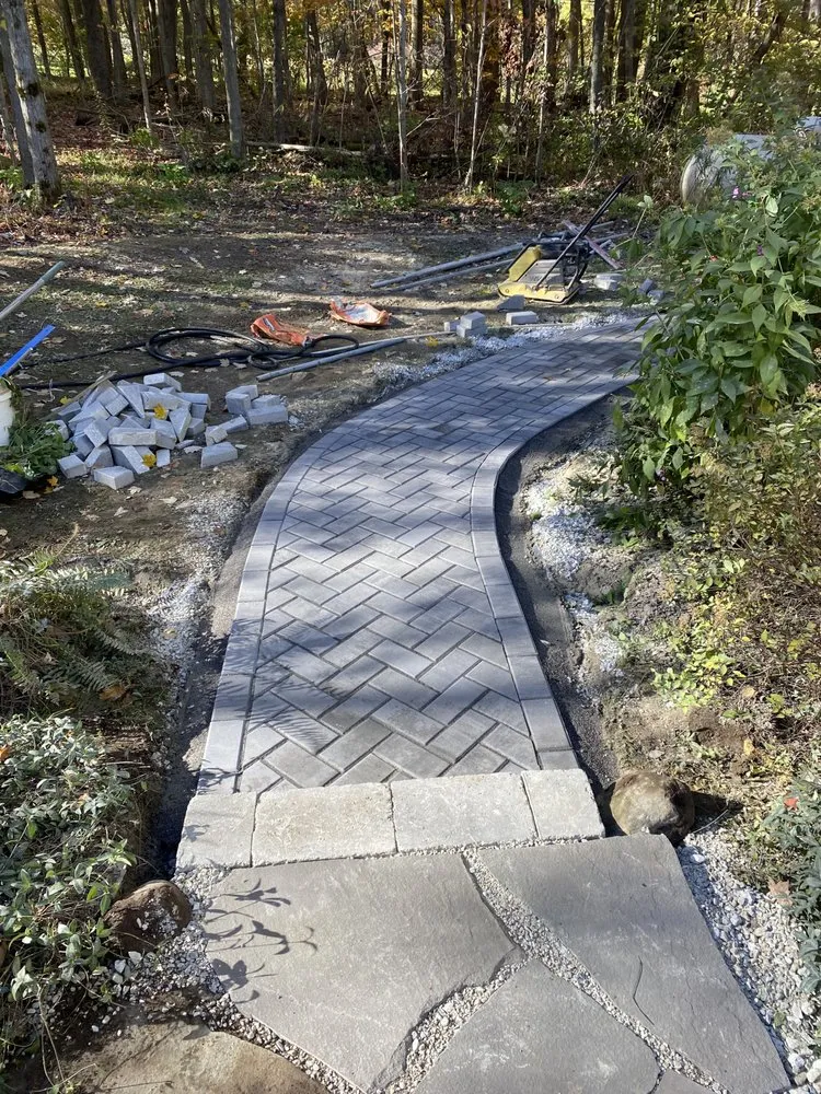 Affordable lawn care service near you in Sherman, NY by Touchstone Hardscapes