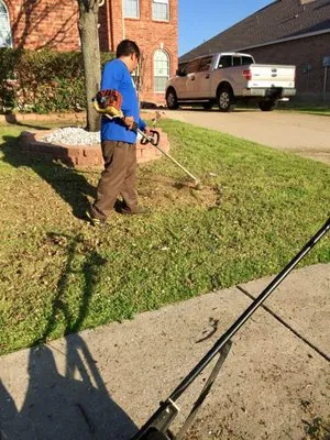 Tovar's Lawn Care Service Logo