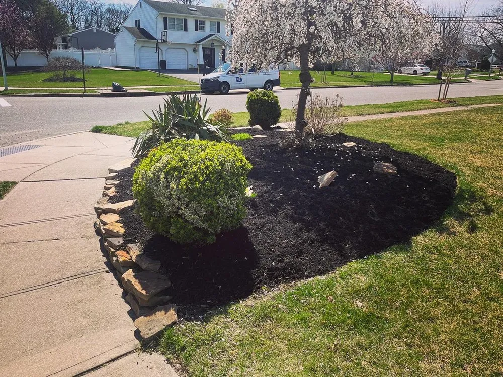 Affordable lawn mowing service for homes in Deer Park, NY by Towers Turf