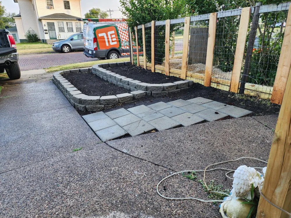 Top-rated yard cleanup service in Clinton, IA by Town & Country Mowing