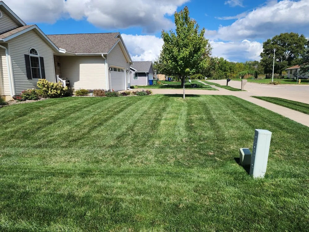Professional residential landscaping experts serving Clinton, IA - Town & Country Mowing