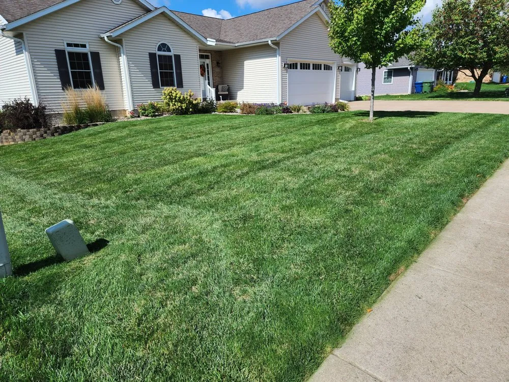 Trusted lawn care service for residential properties across Clinton, IA - Town & Country Mowing