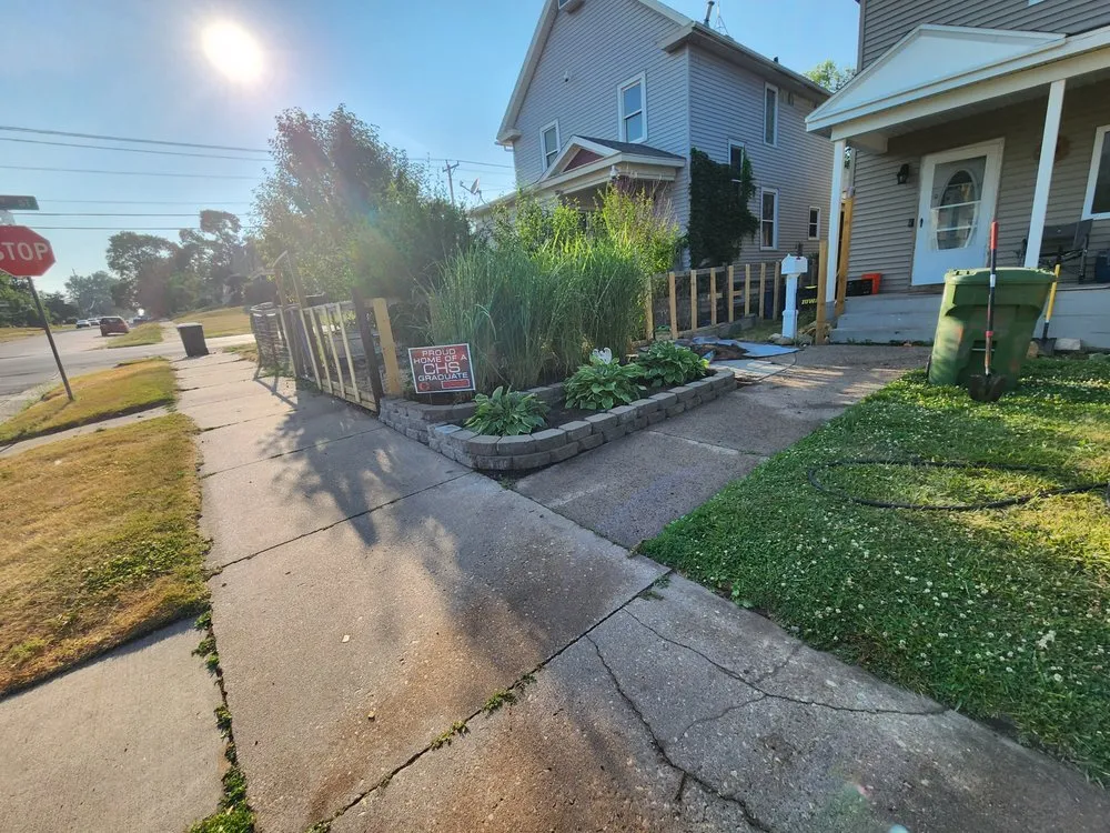 Professional residential landscaping in Clinton, IA by Town & Country Mowing