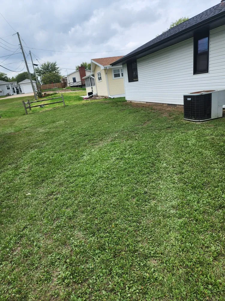 Local yard maintenance for year-round maintenance in Clinton, IA by Town & Country Mowing