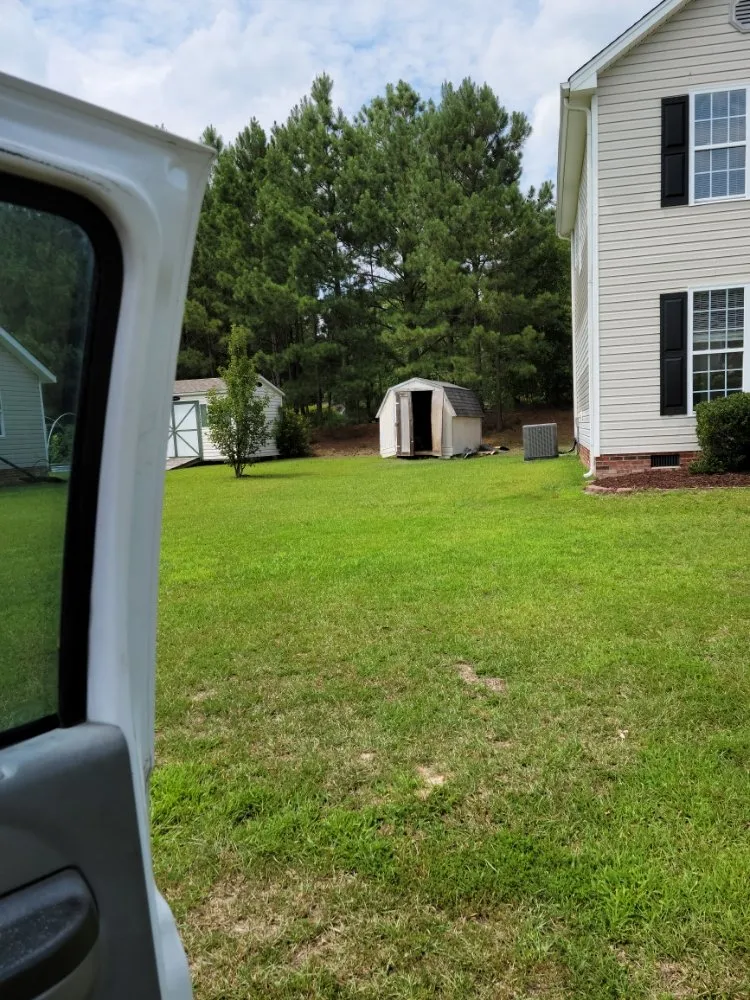 Affordable yard cleanup service for outdoor upgrades in Lillington, NC by TQC Landscaping And Construction LLC