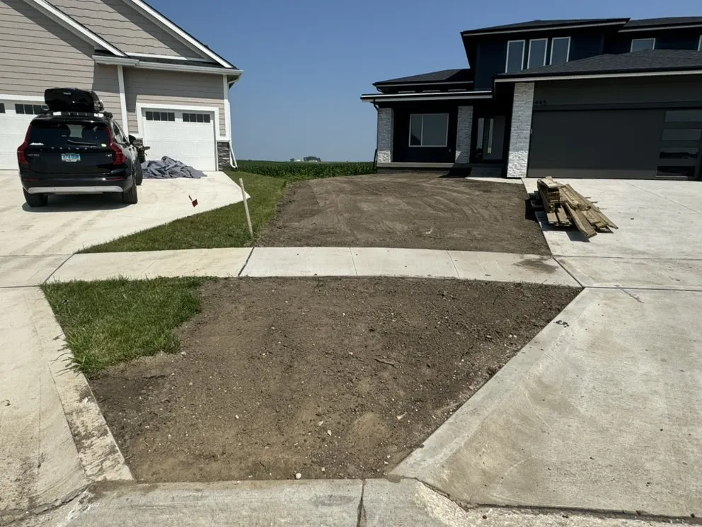 Top-rated lawn care service for beautiful yards in Polk City, IA by Track Works