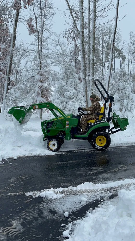 Professional lawn mowing service in Fredericksburg, VA by Tractor Jobs