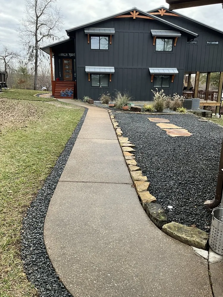 Trusted lawn mowing service in Conroe, TX by Tractor Work Landscaping Pros