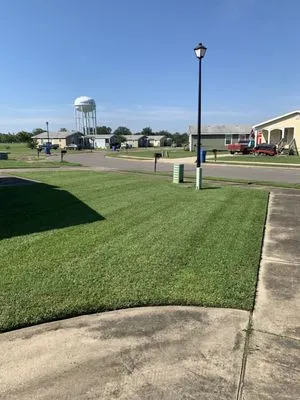 Tradesman outdoor Services Logo