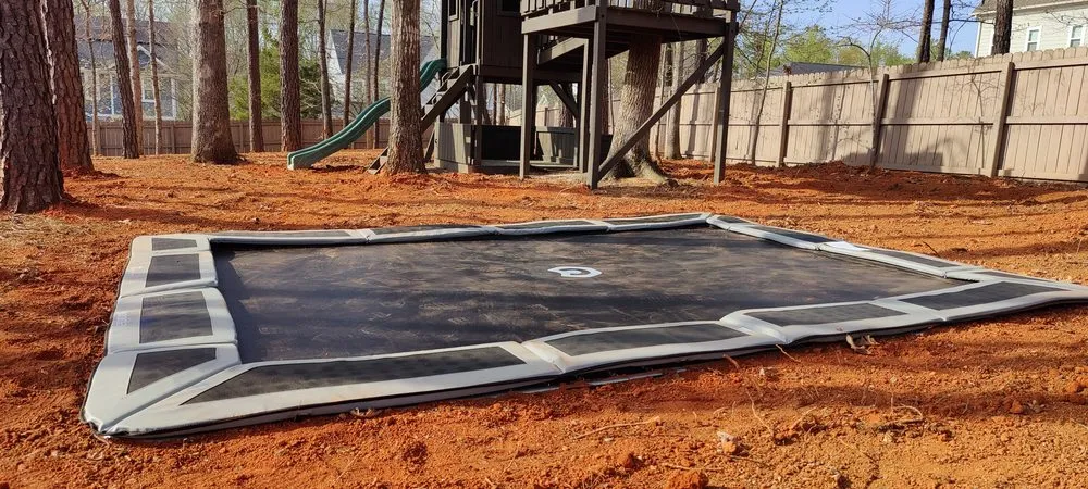 Reliable residential landscaping with custom design in Raleigh, NC by Trampoline Installations