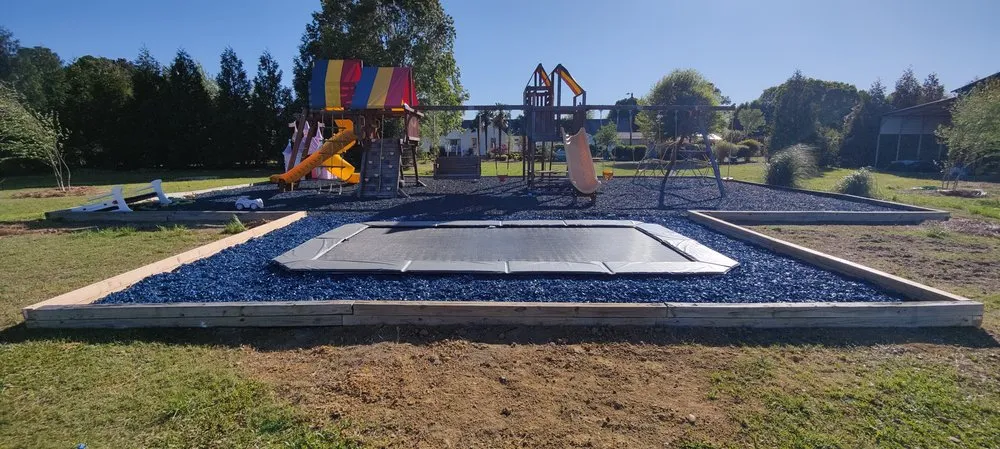 Professional garden landscaping for residential properties in Raleigh, NC by Trampoline Installations