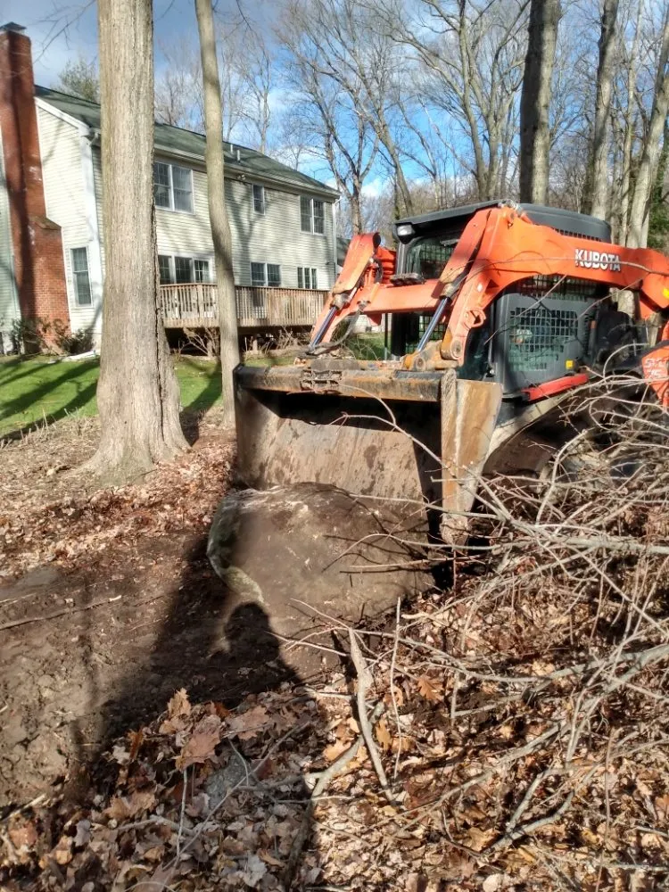 Custom landscaping services with custom design in Clifton, NJ by Tranquility Gardens And Ponds