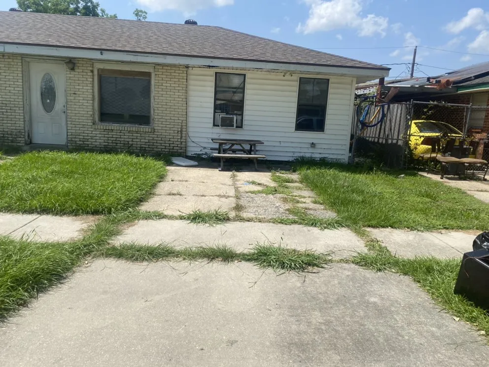 Expert landscaping services for homes in New Orleans, LA by Transitional Enterprises