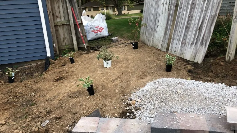 Custom landscaping services for residential properties in Peoria, IL by Trap Construction