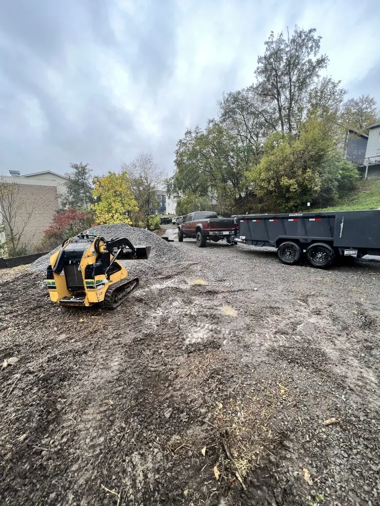 Trusted lawn mowing service with custom design in Morgantown, WV by Travers Hauling & Services