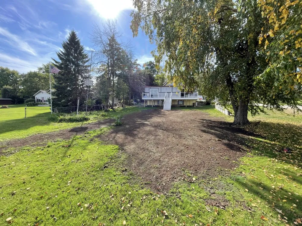 Local lawn mowing service with custom design in Winneconne, WI by Travis Leichtfuss