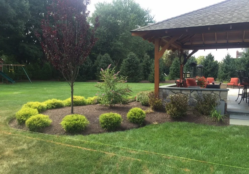 Custom garden landscaping for year-round maintenance in Mansfield, OH by Tread Not Lawn & Landscape