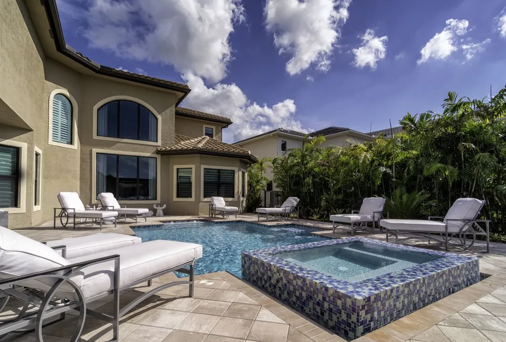 Professional yard maintenance for homes in Boynton Beach, FL by Treasurescapes