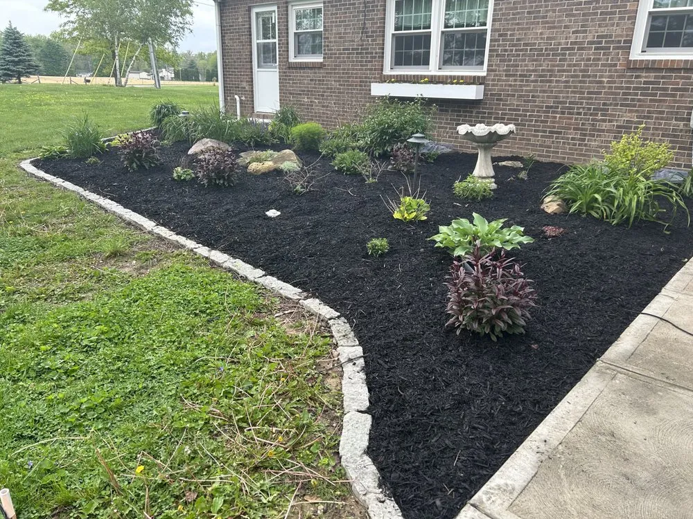 Local landscape installation for beautiful yards in Greensburg, IN by Tree City Mows