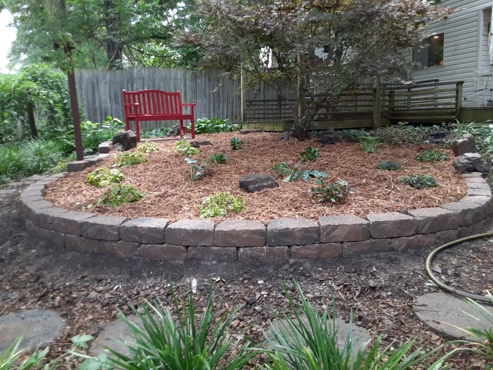 Custom outdoor landscaping for year-round maintenance in Carbondale, KS by Tree of Life Landscaping