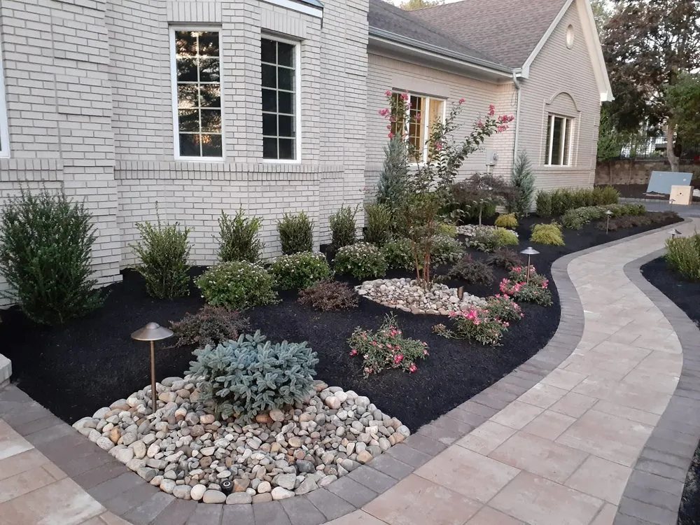 Affordable landscape design for year-round maintenance in Woodbridge Township, NJ by Tree Of Life