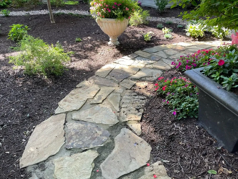 Custom landscape installation in Andover, KS by TreeRific Landscaping