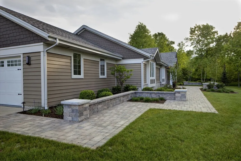 Professional yard maintenance with custom design in Grafton, WI by Treetops Landscape Design