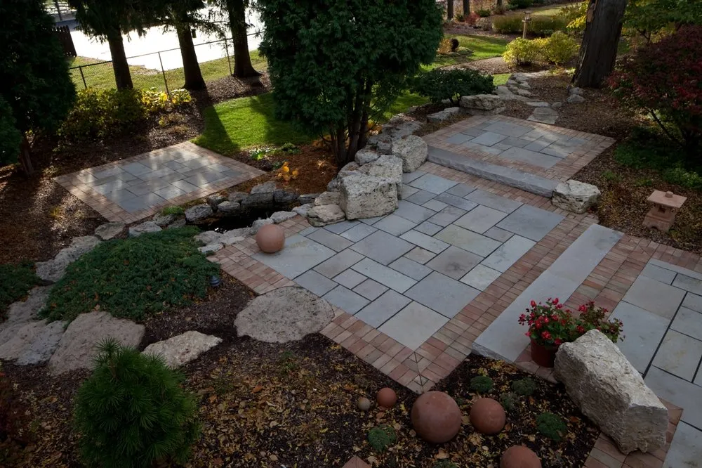 Reliable lawn mowing service for year-round maintenance in Grafton, WI by Treetops Landscape Design