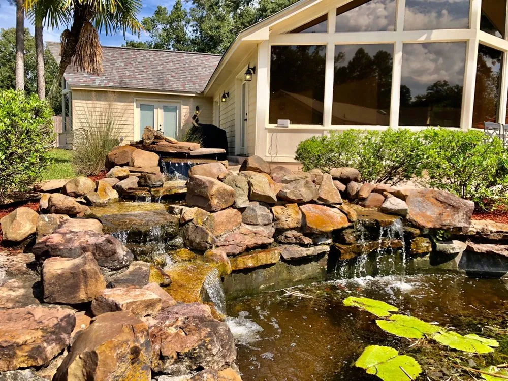 Custom landscape installation in Denham Springs, LA by Treme Landscaping and Grounds Management