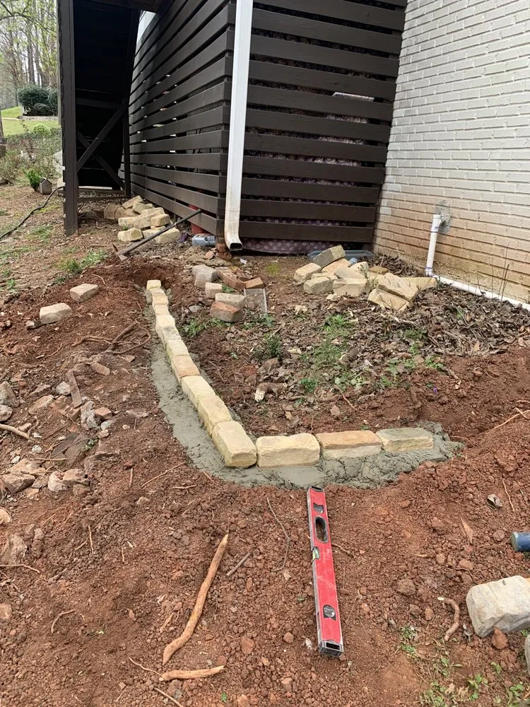 Professional lawn mowing service for homes in Trussville, AL by Trent Construction