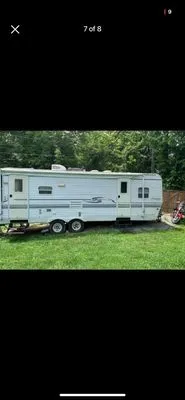 Trent’s , lawn care and odd jobs Logo