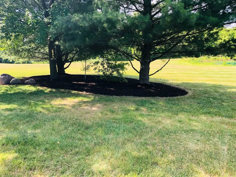 Affordable lawn mowing service for outdoor upgrades across Woodstock, IL - Tres Potrillos Landscaping