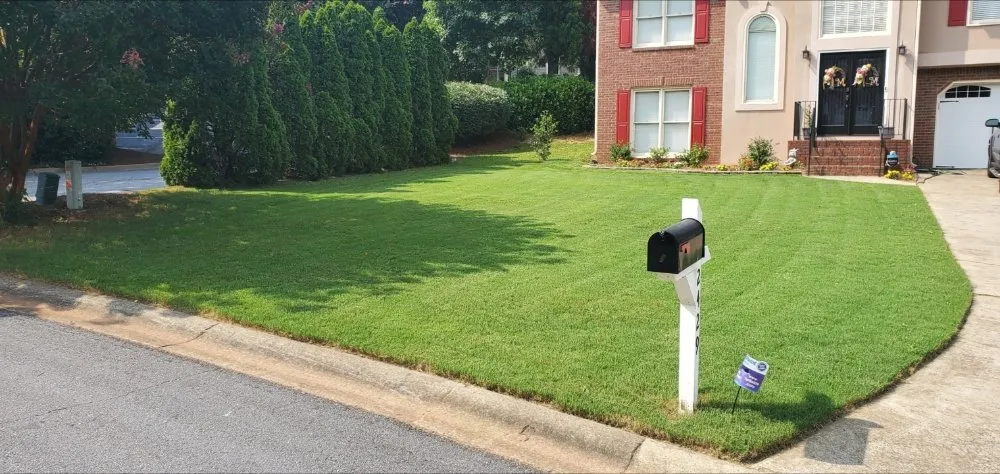 Affordable landscape design for year-round maintenance in Powder Springs, GA by Trey & Son's Lawncare