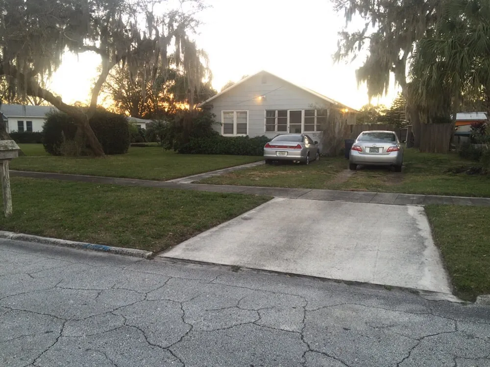 Top-rated lawn mowing service in Orlando, FL by Tri Flame Home Services