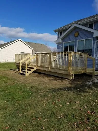 Trusted lawn mowing service with custom design across Spring Grove, IL - Tri Star Landscape & Fencing