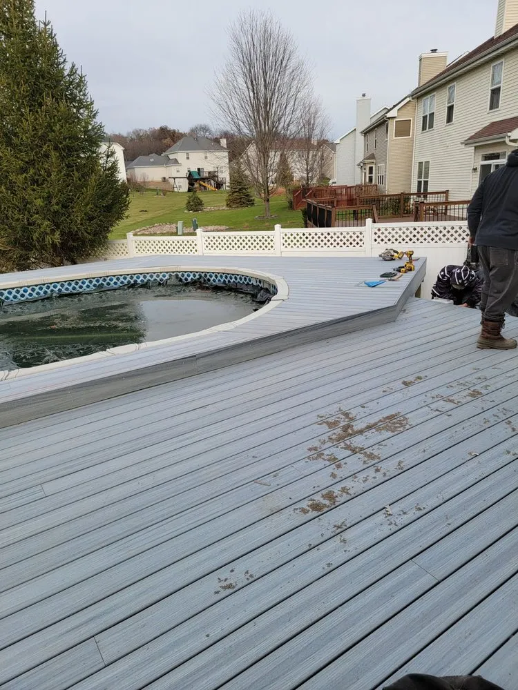 Custom lawn mowing service for residential properties in Spring Grove, IL by Tri Star Landscape & Fencing