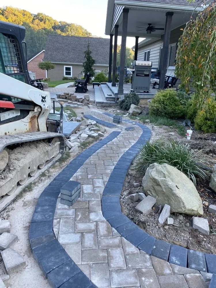 Custom lawn care service for year-round maintenance across Flatwoods, KY - Tri State Enterprise