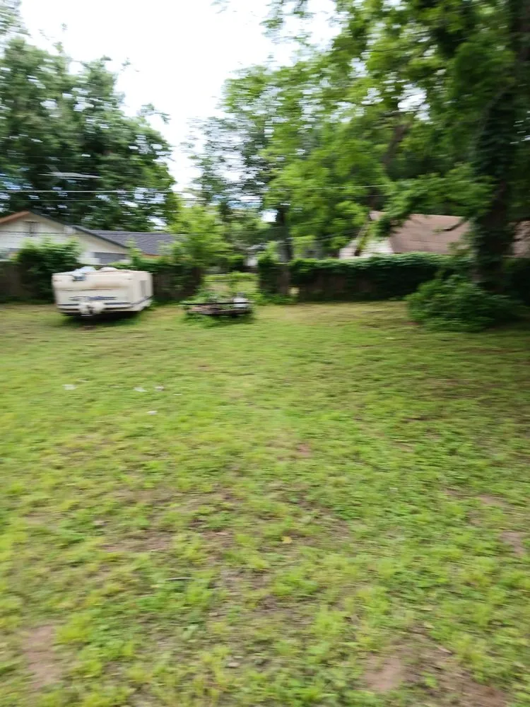 Affordable yard maintenance for homes in Glenpool, OK by Tribal Roots Lawn