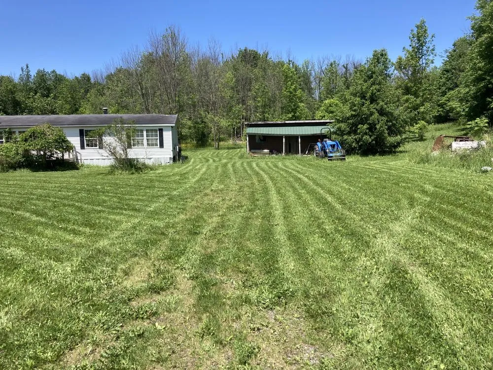 Custom lawn mowing service in Throop, NY by Trident Storm Recovery