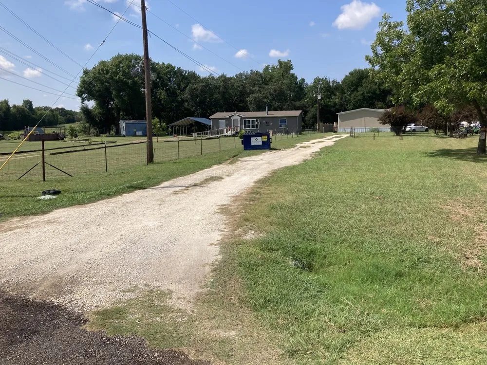 Custom lawn mowing service for residential properties in Weatherford, TX by Trim Stars