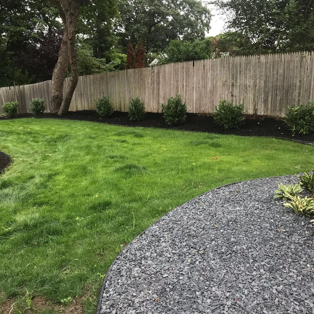 Expert garden landscaping for beautiful yards in Hauppauge, NY by Trimarchi Landscaping & Designs