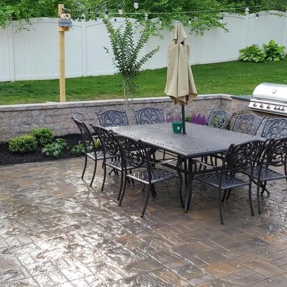 Local lawn mowing service for homes in Hauppauge, NY by Trimarchi Landscaping & Designs