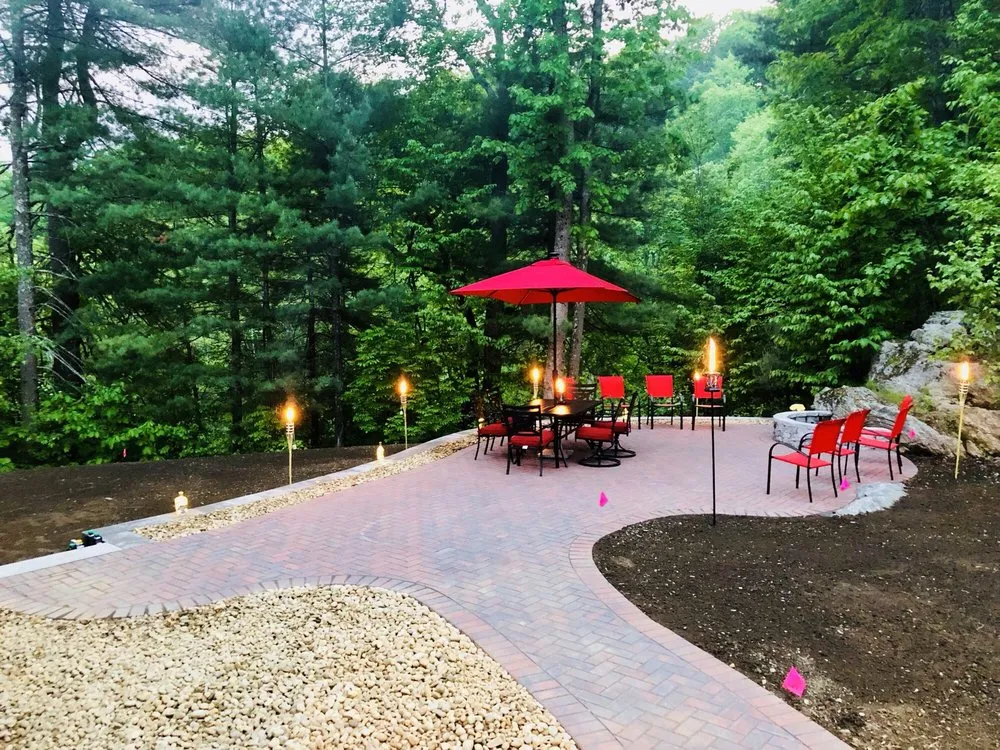 Affordable yard maintenance with custom design across Londonderry, NH - Trimmers Landscaping