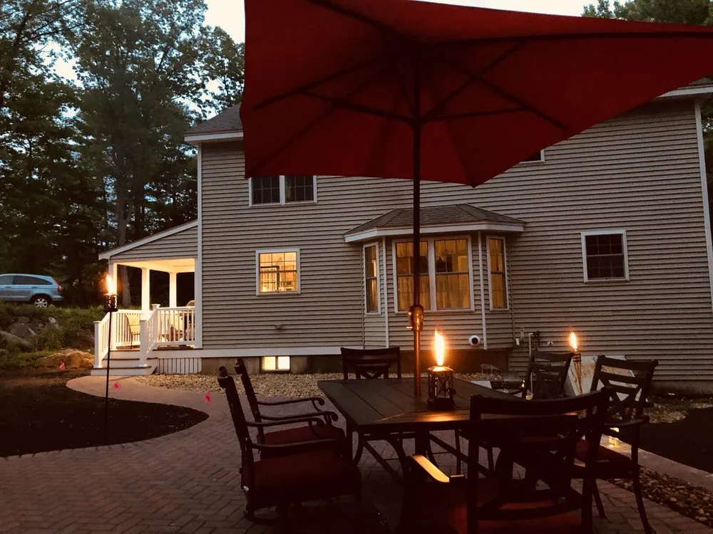 Custom yard maintenance for outdoor upgrades in Londonderry, NH by Trimmers Landscaping