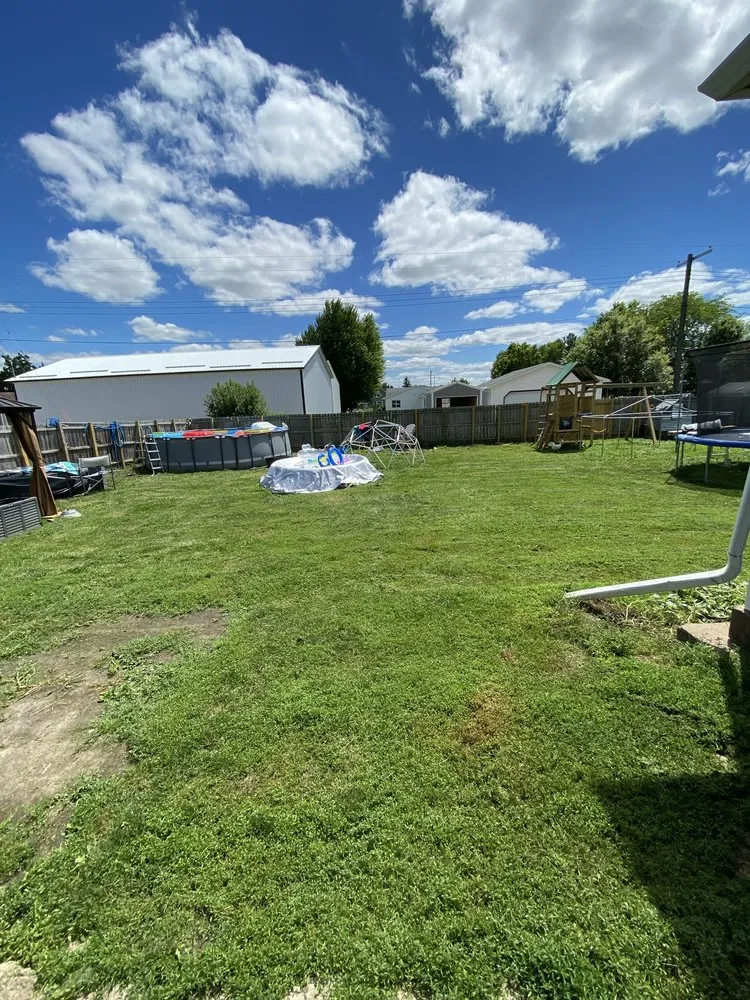 Professional garden landscaping for beautiful yards in Lewiston, MN by Triple Cut Cousins