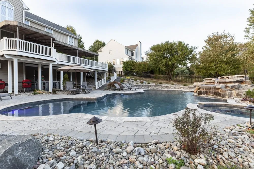 Custom yard cleanup service for year-round maintenance in Boyertown, PA by Triton Landscaping