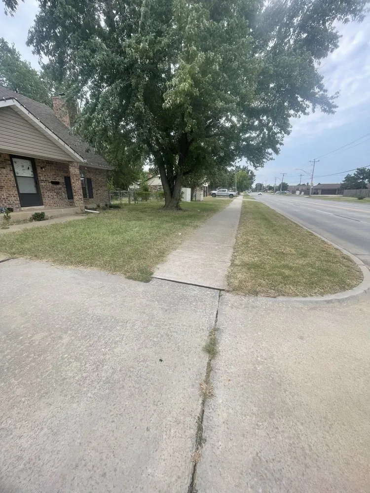 Affordable lawn care service in Moore, OK by Trojan Lawn Care