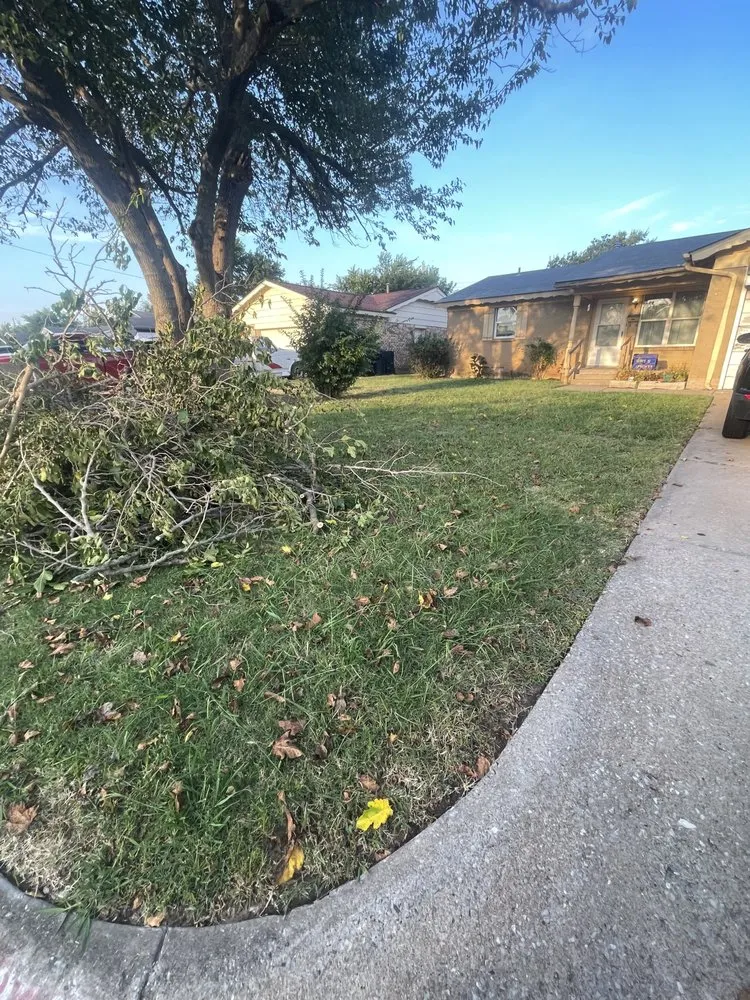Custom landscape design for year-round maintenance in Moore, OK by Trojan Lawn Care