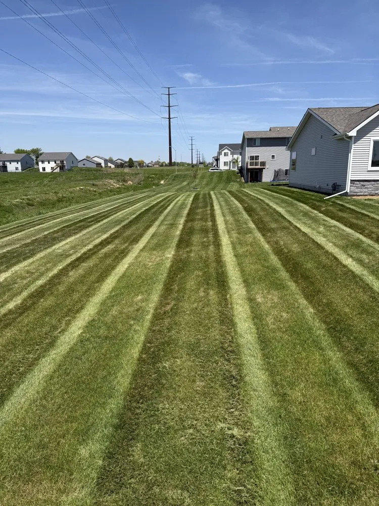 Expert landscape design for beautiful yards in Des Moines, IA by Trophy Lawn & Site Services